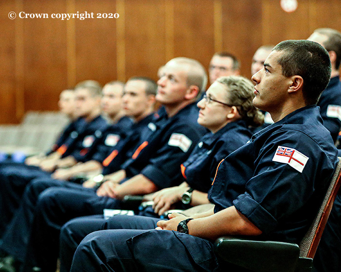 Naval personnel in a briefing