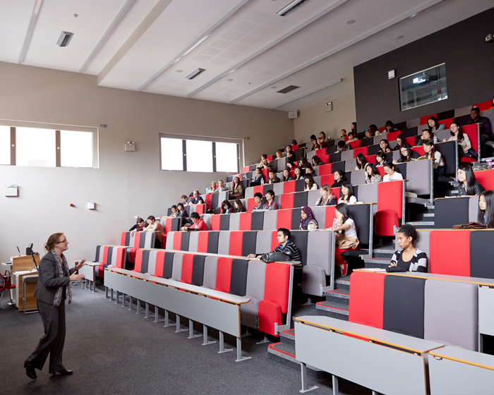 View of rows of seats from the front of a lecture taking place in the David Chiddick Building